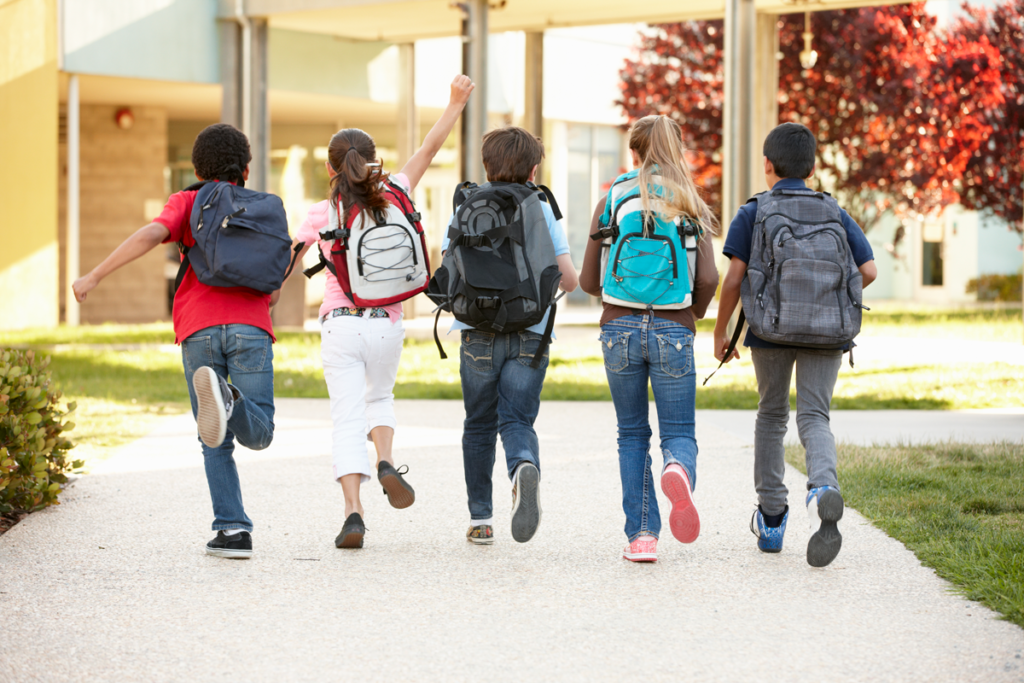 School kids walking outside